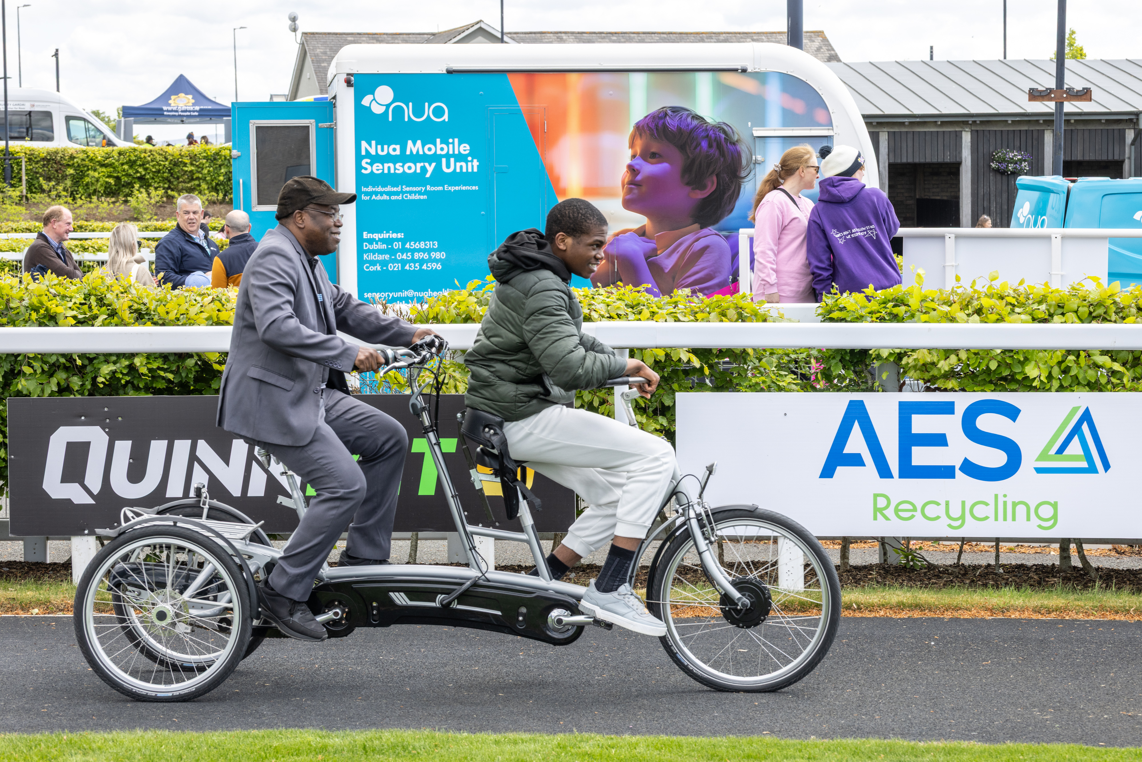 People on tandem bike.